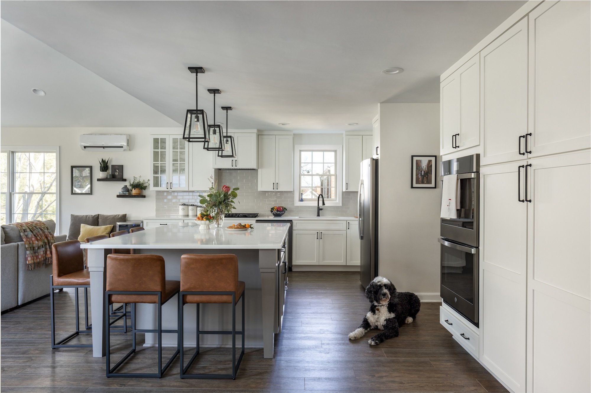 <img alt="Award-winning modern kitchen in Bethesda featuring white cabinets, stainless steel appliances, a large island with white countertop, brown leather barstools, pendant lighting, and dark wood flooring. Cozy seating area visible on the left." src="#" /> <img alt="Award-winning modern kitchen in Bethesda featuring white cabinets, stainless steel appliances, a large island with white countertop, brown leather barstools, pendant lighting, and dark wood flooring. Cozy seating area visible on the left." src="#" />
