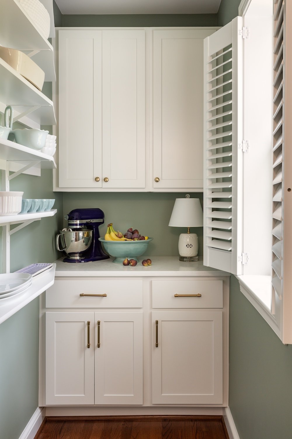 <img alt="A small kitchen nook in Northwest DC features white cabinets with gold handles, a mixer, fresh fruit, a cozy lamp, and sunlit shutters. Designed by an award-winning remodeler, it boasts light green walls, wood floors, and open shelves with dishes." src="#" /> <img alt="A small kitchen nook in Northwest DC features white cabinets with gold handles, a mixer, fresh fruit, a cozy lamp, and sunlit shutters. Designed by an award-winning remodeler, it boasts light green walls, wood floors, and open shelves with dishes." src="#" />