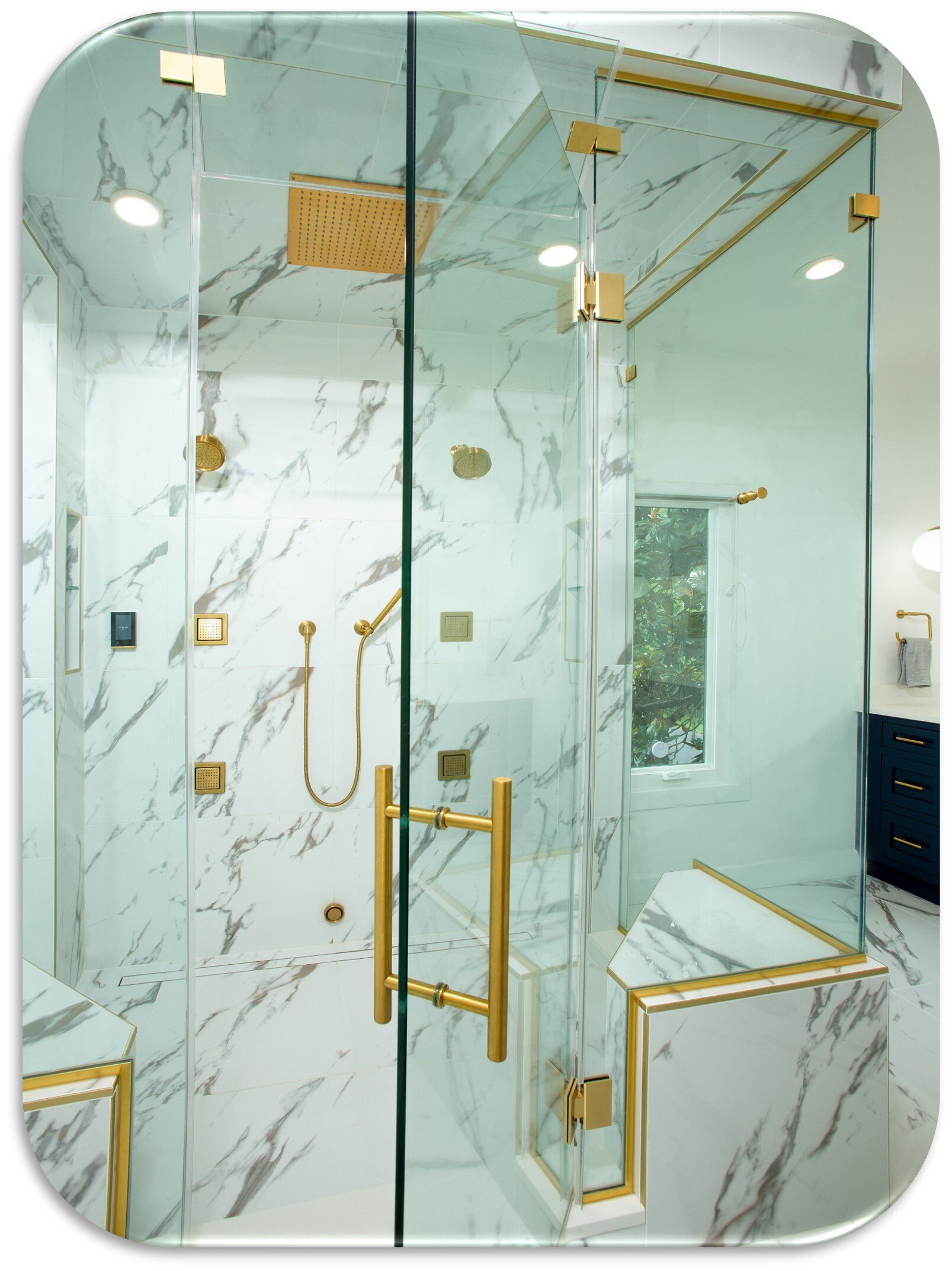 Alt text: A modern bathroom featuring a glass shower with transparent walls, a stylish mirror, and artistic design elements. The interior design includes sleek finishes and a well-organized space.