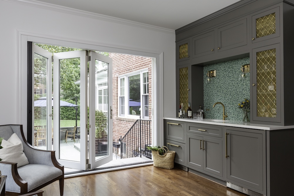 Award winning remodeler in Montgomery county grey cabinets with green tile and Bar Doors Open